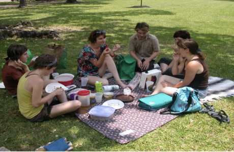 Family eating picnic lunch