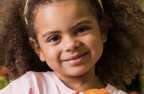 girl holding food